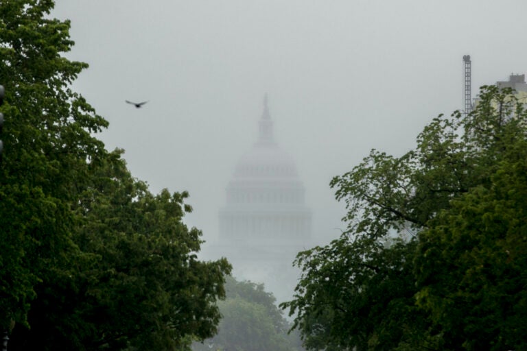 In this May 22, 2020, file photo the Dome of the U.S. Capitol Building is visible through heavy fog in Washington. (AP Photo/Andrew Harnik)