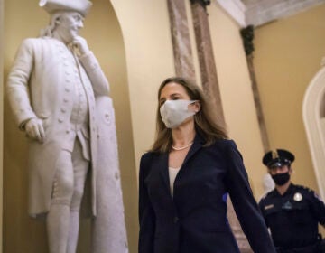 Judge Amy Coney Barrett, President Donald Trump’s nominee for the Supreme Court, arrives for closed meetings with senators, at the Capitol in Washington, Wednesday, Oct. 21, 2020. (AP Photo/J. Scott Applewhite)