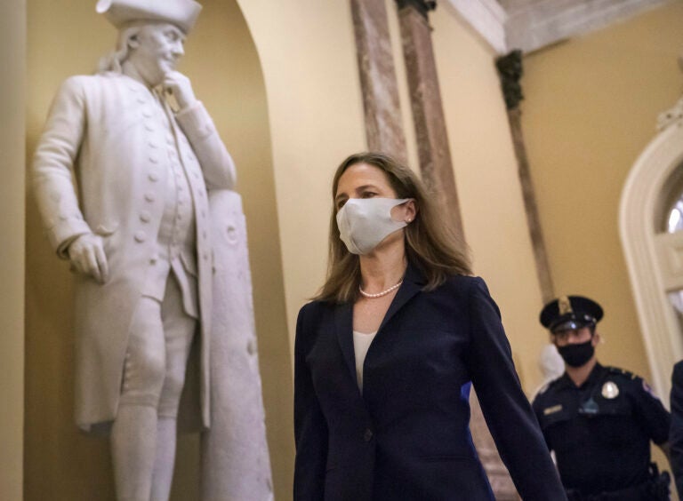 Judge Amy Coney Barrett, President Donald Trump’s nominee for the Supreme Court, arrives for closed meetings with senators, at the Capitol in Washington, Wednesday, Oct. 21, 2020. (AP Photo/J. Scott Applewhite)