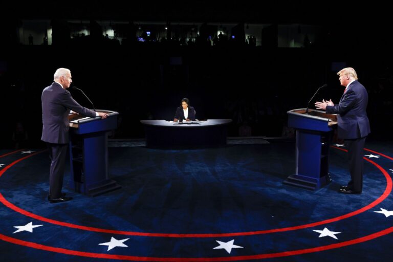 
President Donald Trump and Democratic presidential candidate former Vice President Joe Biden participate in the final presidential debate at Belmont University, Thursday, Oct. 22, 2020, in Nashville, Tenn.  (Jim Bourg/Pool photo via AP)