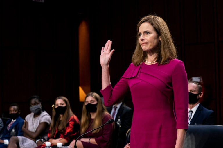 Supreme Court nominee Amy Coney Barrett is sworn in during her Senate Judiciary Committee confirmation hearing