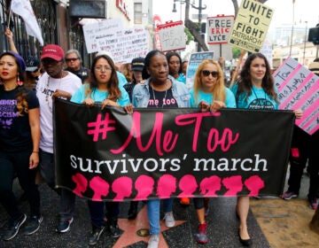 Tarana Burke marches with others at the #MeToo March in the Hollywood section of Los Angeles in 2017