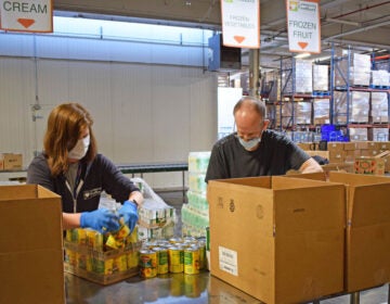 Volunteers sort food at the Community FoodBank of New Jersey.