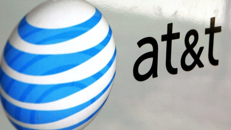 An AT&T logo is displayed on an AT&T truck