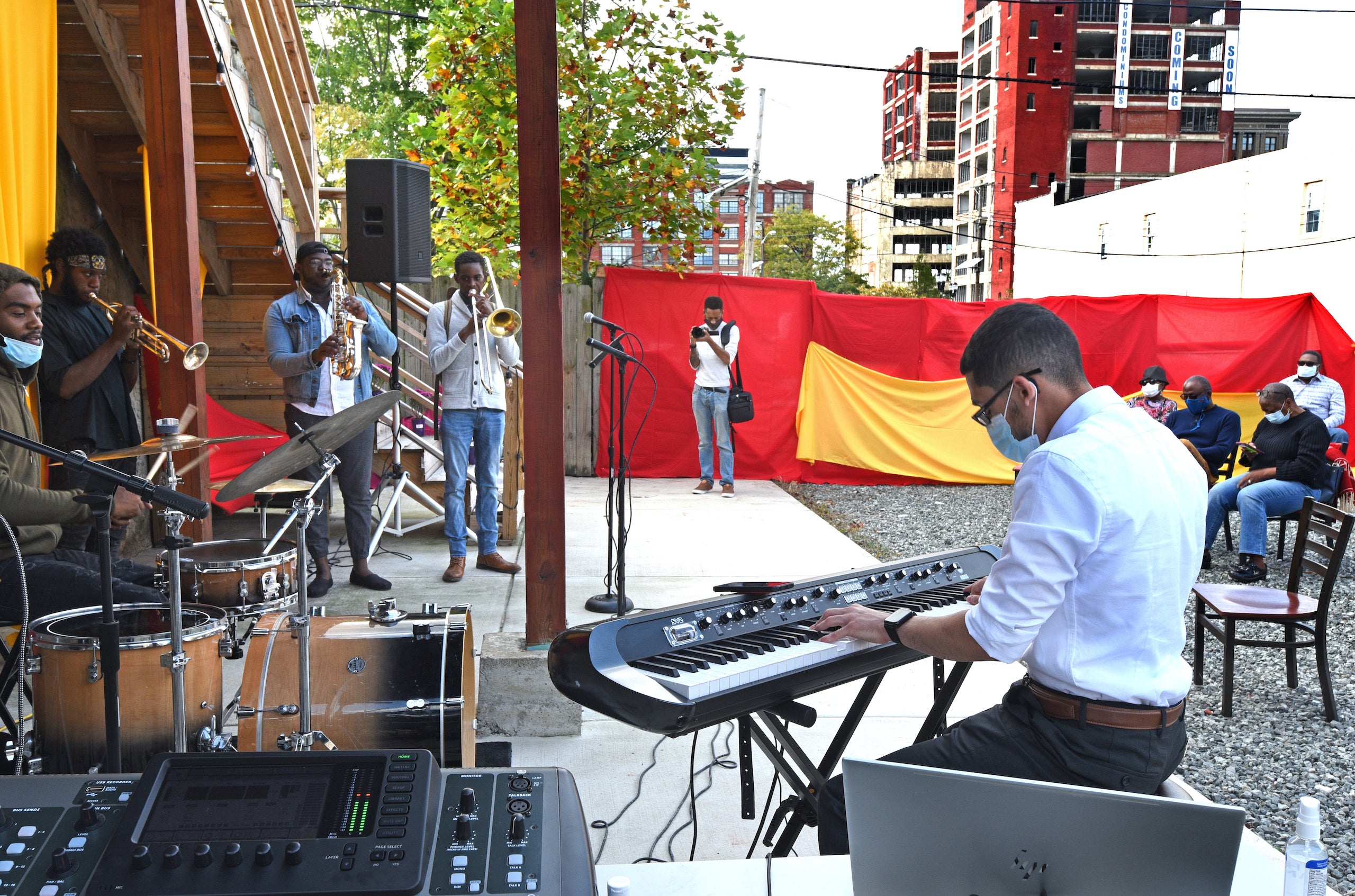 Jazz musicians perform in the IDEA Center's backyard