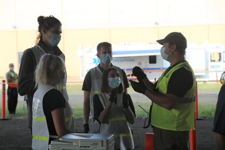 Medical workers at a COVID-19 testing site in McKeesport, Pa. (Katie Blackley/WESA)