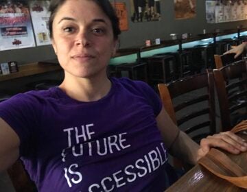 Woman wearing a shirt that says 'The future is accessible'