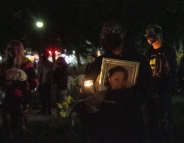 People gathered at Malcolm X Park in West Philadelphia to hold a vigil for Breonna Taylor on Oct. 1, 2020. (Kimberly Paynter/WHYY)