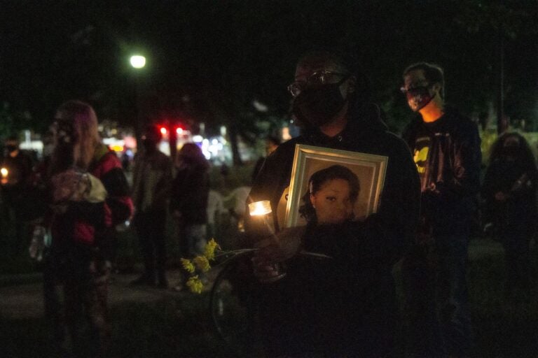 People gathered at Malcolm X Park in West Philadelphia to hold a vigil for Breonna Taylor on Oct. 1, 2020. (Kimberly Paynter/WHYY)