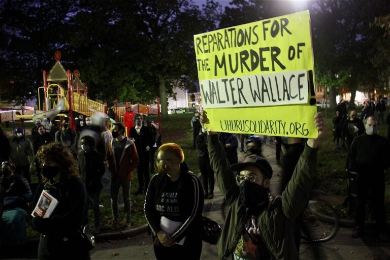 A crowd gathers at Malcolm X Park to protest the police shooting of Walter Wallace Jr.