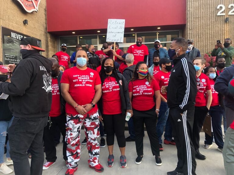 IAFF 22 Firefighters and EMTs protest their union's endorsement of Trump without their knowledge or consent. (Robby Brod /WHYY)