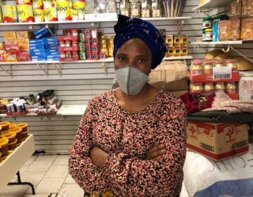 Korkor Kamara, owner of Kamara African foods on Woodland Avenue in Southwest Philadelphia. (Miles Bryan/WHYY)