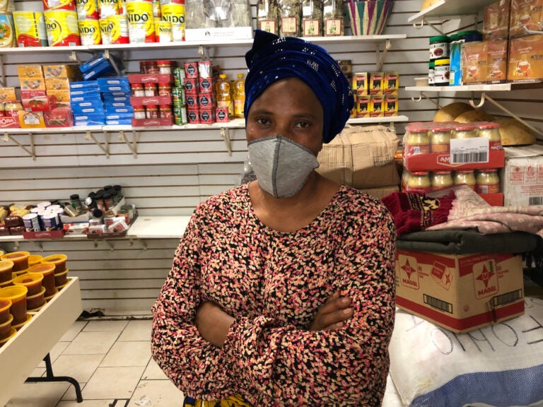 Korkor Kamara, owner of Kamara African foods on Woodland Avenue in Southwest Philadelphia. (Miles Bryan/WHYY)