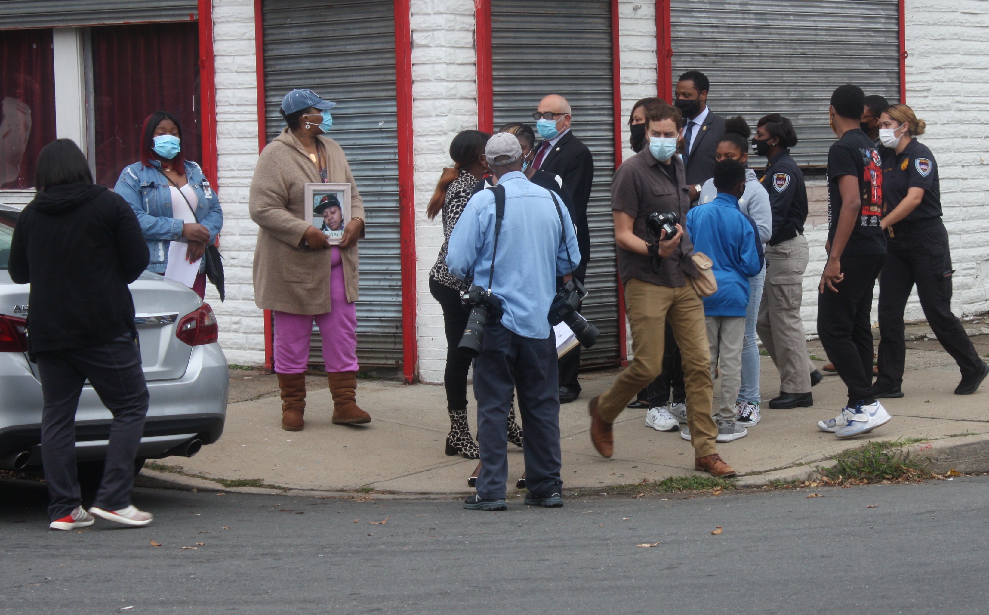 Trenton Mayor Reed Gusciora and Police Director Sheilah Coley visit the scene of double homicide following a news conference