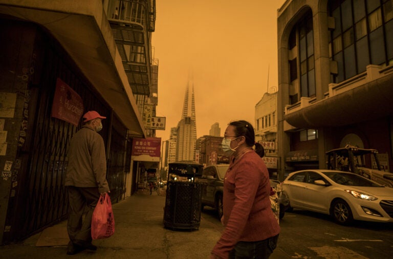 Pollution is a global problem. Above: Stockton Street in the Chinatown district of San Francisco on Sept. 9, a time when air quality was affected by wind and wildfires. People wearing protective masks walk on Stockton Street in the Chinatown district of San Francisco
