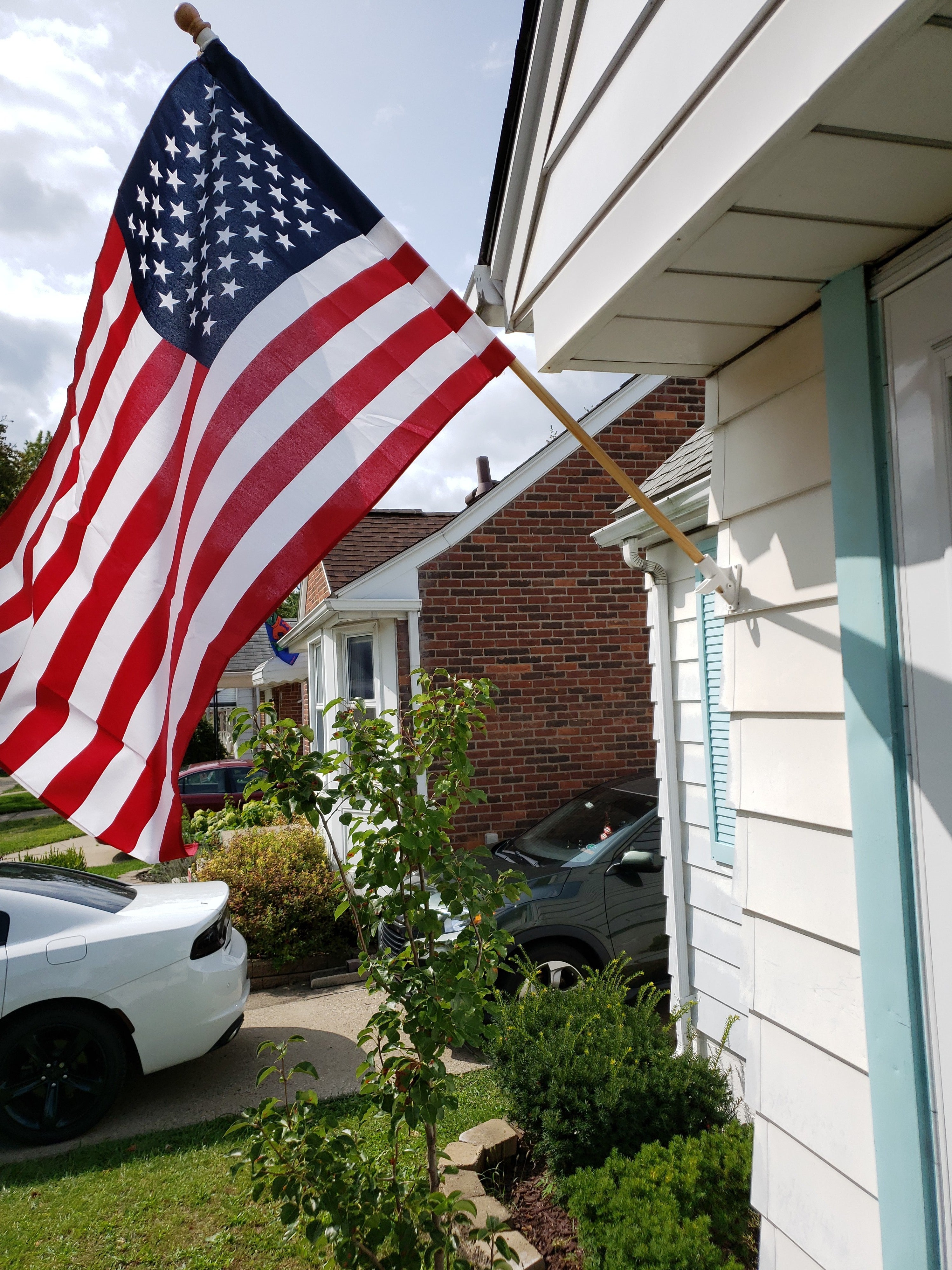 The U.S. flag he flies next to An Vu's garage