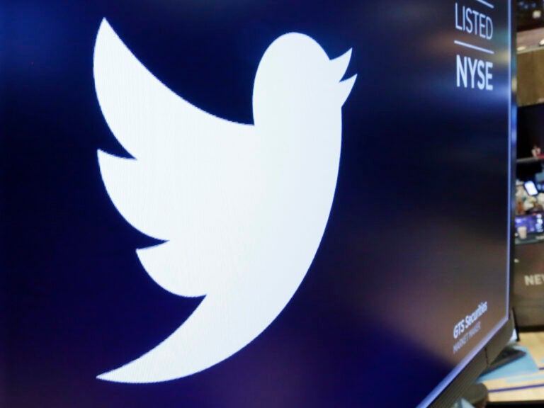 Twitter said it will make changes to how preview images are cropped amid concerns about possible bias. Some Twitter users posted images the site's algorithm selected white faces over Black ones in preview images. (Richard Drew/AP)