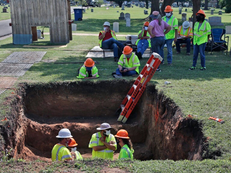 A second excavation is planned in Tulsa, Okla., this week to unearth potential unmarked mass graves from a race massacre in 1921. In July, researchers began excavation at Oaklawn Cemetery, shown here. They found no evidence of human remains at that particular excavation site. (Sue Ogrocki/AP)