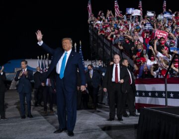 President Donald Trump arrives for a campaign rally at Harrisburg International Airport, Saturday, Sept. 26, 2020, in Middletown. U.S. Rep. Lloyd Smucker, R-Lancaster/York, is at far left. (Evan Vucci/AP Photo)