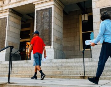 Voters walk along the steps of the York County Courthouse on June 1, 2020, to deposit their ballots in a drop box ahead of the Pennsylvania primary. (Kate Landis/PA Post)