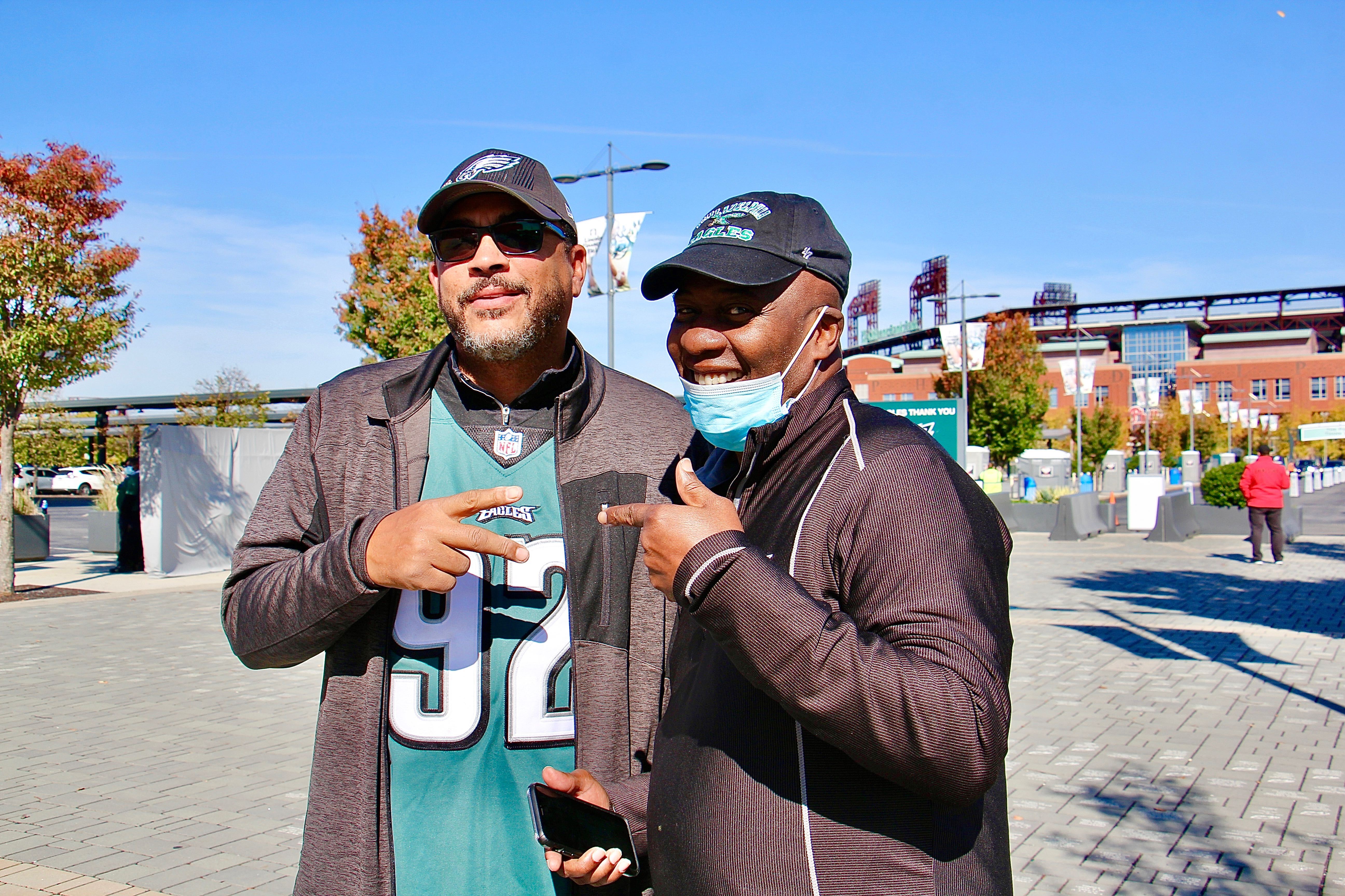 College buddies James Griffin of Philadelphia and Norman Oliver of Wilmington get together at Lincoln Financial Field to watch the Eagles play
