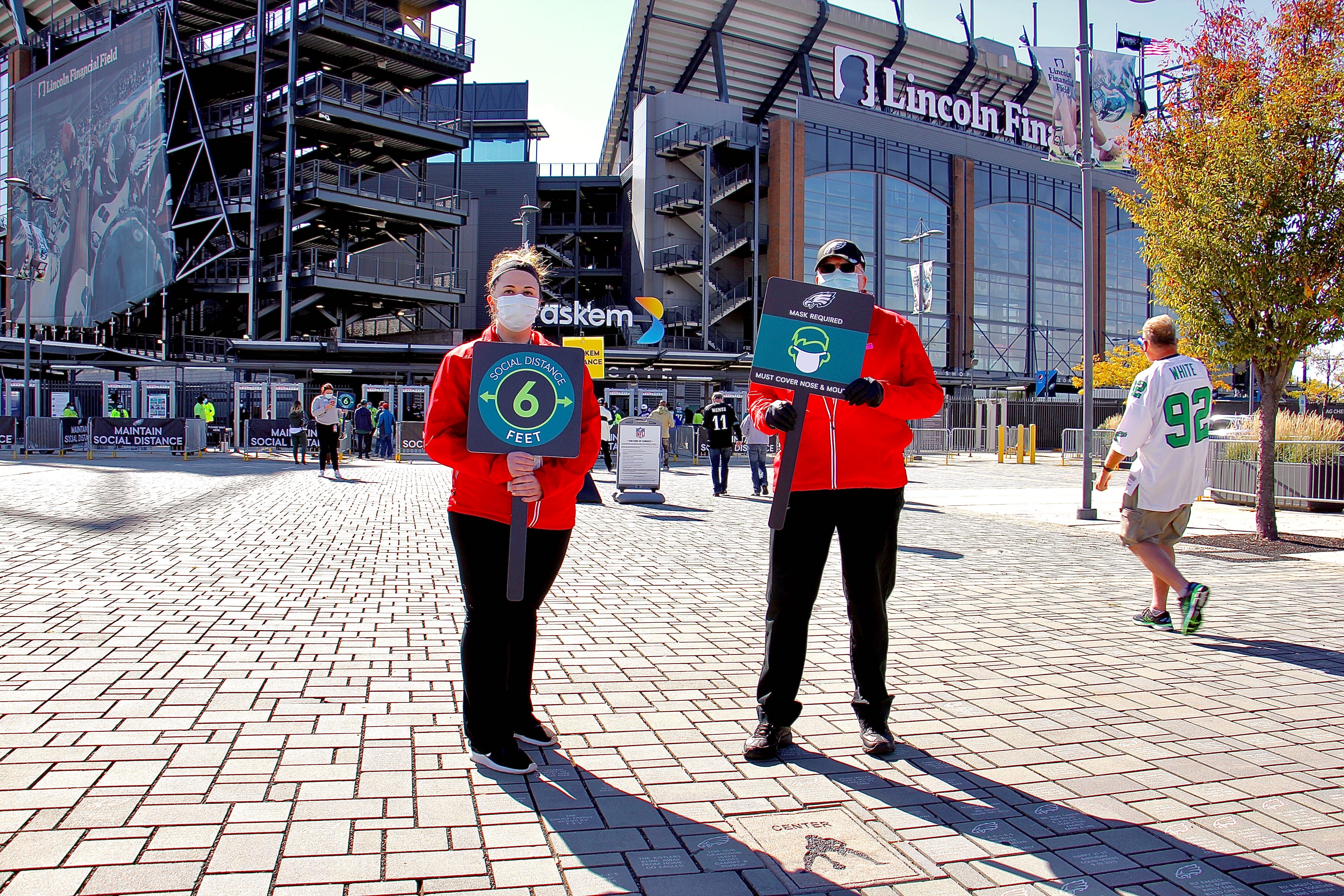 Game day staffers Nicole Teklits and Daniel Bittner outside the Linc