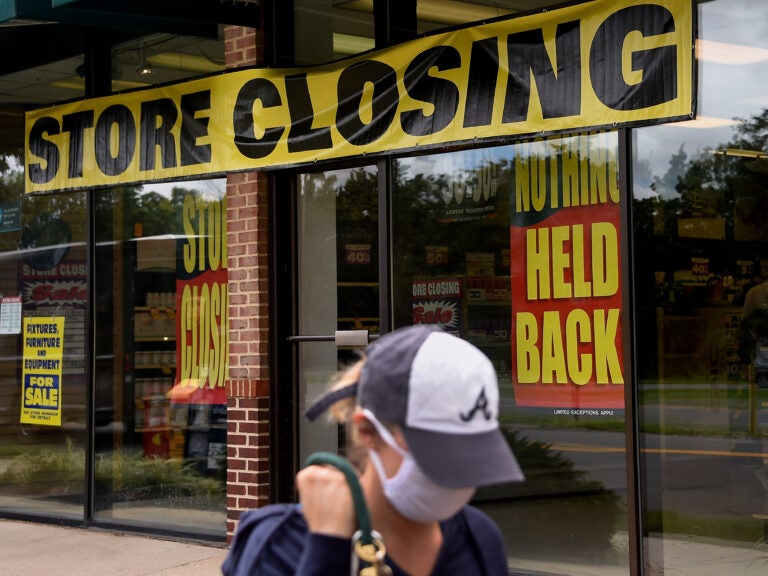 A store displays a sign before closing down permanently following the impact of the coronavirus pandemic, on Aug. 4, 2020 in Arlington, Va. The Small Business Administration's inspector general office said billions of dollars in relief loans may have been handed out to fraudsters or ineligible applicants. (Olivier Douliery/AFP via Getty Images)