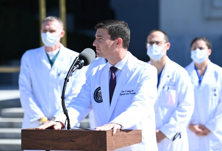 White House physician Sean Conley briefs the press on Saturday on the condition of President Trump, who was hospitalized the evening before because of the coronavirus.