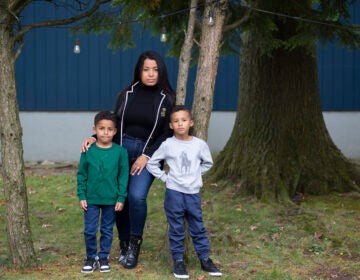Farida Mercedes and her two sons Sebastian, 5, (left) and Lucas, 7, stand in their backyard in Fairlawn, N.J. Mercedes left her job as an assistant VP of HR at L'Oreal in August after working there for 17 years. As hundreds of thousands of women dropped out of the workforce in September, Latinas led the way, leaving at nearly three times the rate of white women.
