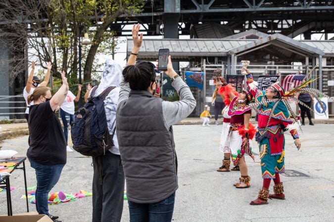 Members of the Norristown community watch Kapulli Kamaxtle Xiuhcoatl perform.