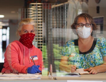 Poll workers took COVID safety precautions during the June primary. Many more voters are expected for the general. (Zach Hughes/WHYY)