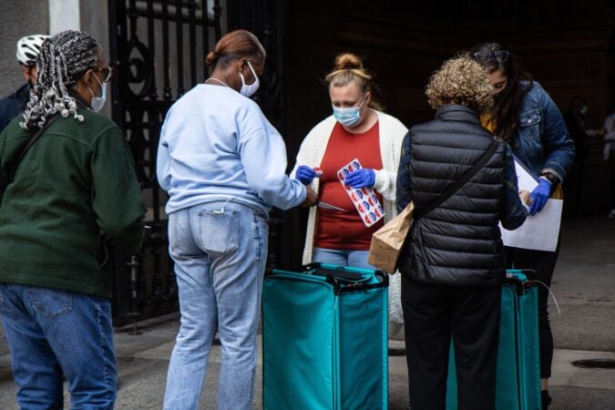 Voters exchange ballots for “I Voted Today” stickers