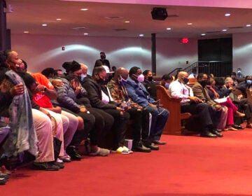 Family of the late Walter Wallace Jr. fill the front row of a community meeting inside a church, the day after he was shot to death by police. (Michaela Winberg/Billy Penn)