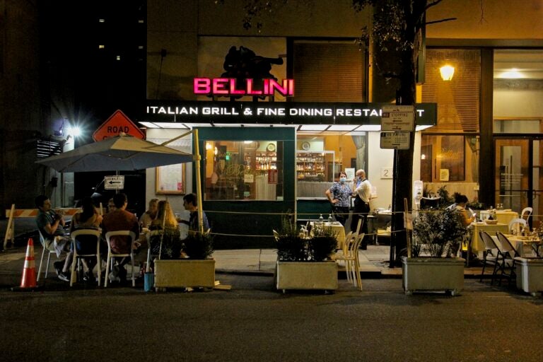 A restaurant on 16th Street in Center City uses the street for outdoor dining. (Emma Lee/WHYY)