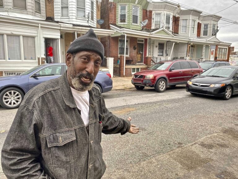Roger 'Texas' Brown, 62, stands outside his home in the Frankford neighborhood Nov. 12, 2020. (Taylor Allen/WHYY)