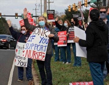 Nurses picket at the entrance to St Mary Medical Center in Langhorne, Pa. About 800 nurses went on strike on Nov. 17 citing long simmering grievances over wages and staffing levels. They returned to work after a two-day walkout. (Emma Lee/WHYY)