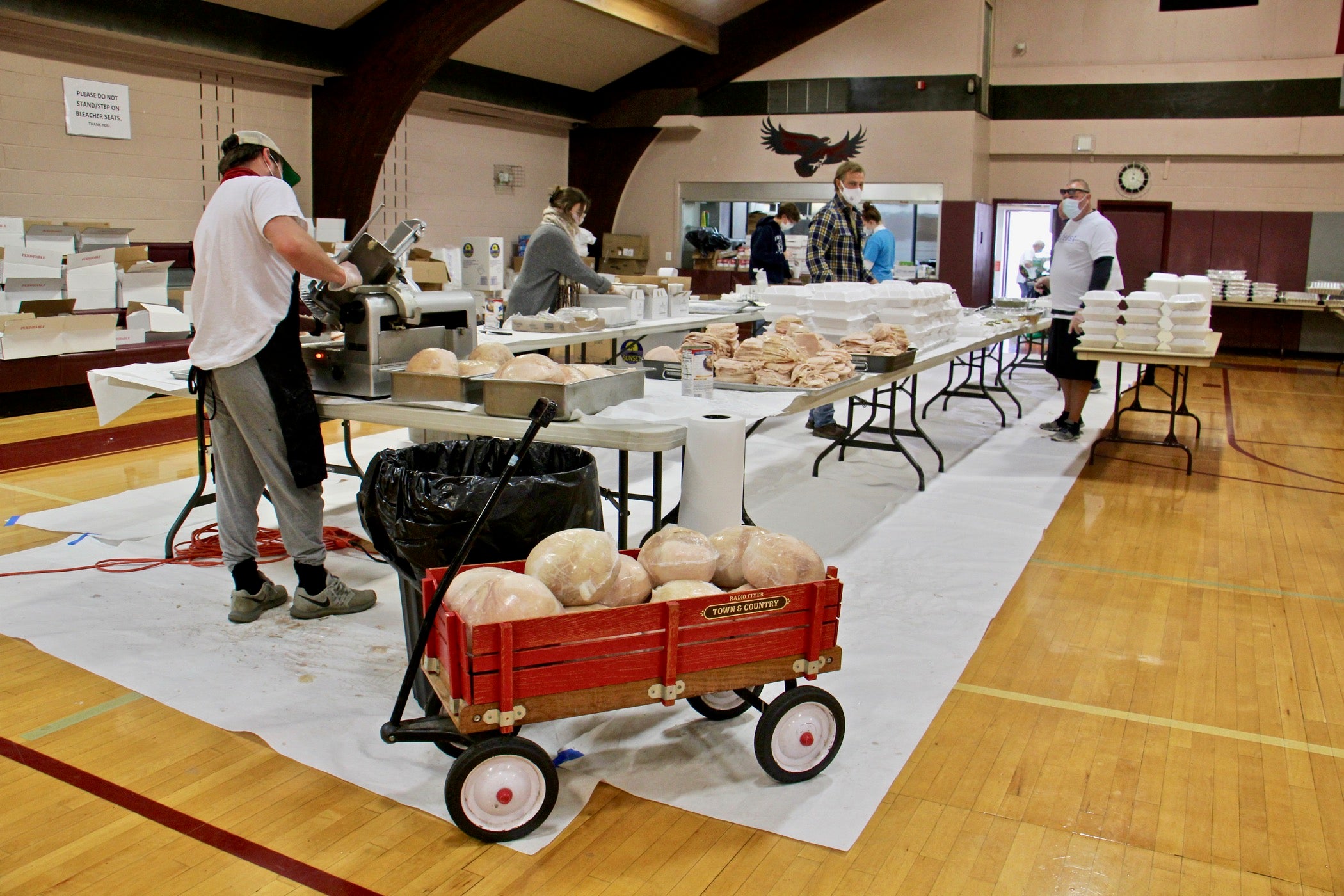 A wagon load of turkey breasts await slicing at St. Robert Bellarmine Church in Warrington