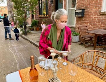 Martha Rich sets up tables to share with her neighbors on her street in South Philly.