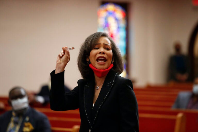 Rep. Lisa Blunt Rochester speaks with Democratic presidential candidate, former Vice President Joe Biden, members of the clergy and community leaders at Bethel AME Church in Wilmington, Del., Monday, June 1, 2020. (AP Photo/Andrew Harnik)