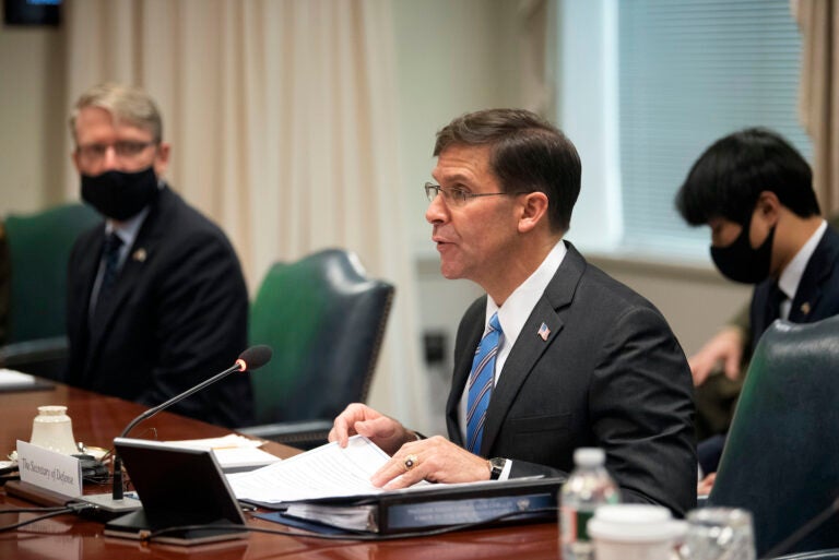 Defense Secretary Dr. Mark T. Esper meets with Korean Defense Minister Suh Wook at the Pentagon on Wednesday, Oct. 14, 2020 in Washington.   (AP Photo/Kevin Wolf)