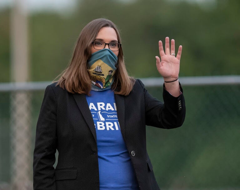 In this Tuesday, Sept. 15, 2020 file photo, transgender activist Sarah McBride, who hopes to win a seat in the Delaware Senate, campaigns at the Claymont Boys & Girls Club in Claymont, Del. (AP Photo/Jason Minto)