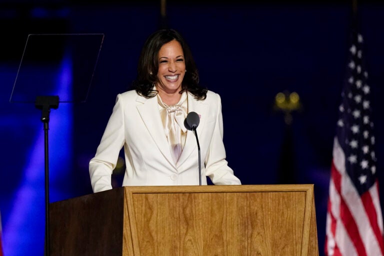 Vice President-elect Kamala Harris speaks from a podium