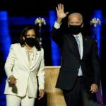 President-elect Joe Biden, right, on stage with Vice President-elect Kamala Harris, left, Saturday, Nov. 7, 2020, in Wilmington, Del. (AP Photo/Andrew Harnik, Pool)