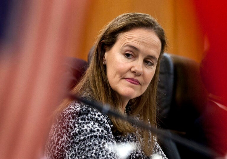 This Dec. 7, 2011 file photo shows former U.S. Defense Undersecretary Michele Flournoy, preparing for a bilateral meeting in Beijing, China. (AP Photo/Andy Wong)
