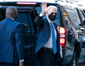 President-elect Joe Biden waves as he arrives The Queen theater for a meeting with Vice President-elect Kamala Harris, Senate Minority Leader Chuck Schumer of N.Y., and House Speaker Nancy Pelosi of Calif., Friday, Nov. 20, 2020, in Wilmington, Del. (AP Photo/Alex Brandon)