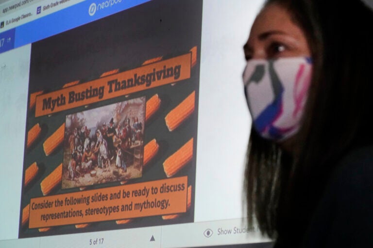 Susannah Remillard teaches her sixth-grade students at Cape Cod Lighthouse Charter School, Thursday, Nov. 19, 2020, in East Harwich, Mass. In a growing number of U.S. schools, students are now learning a more complex Thanksgiving story that involves conflict, injustice and a new focus on the native people who lived in New England for centuries before European settlers arrived. (AP Photo/Elise Amendola)