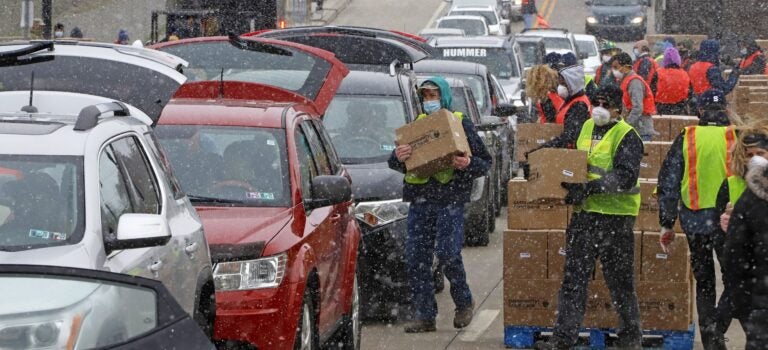 Boxes of food are distributed by the Greater Pittsburgh Community Food Bank, at a drive thru distribution