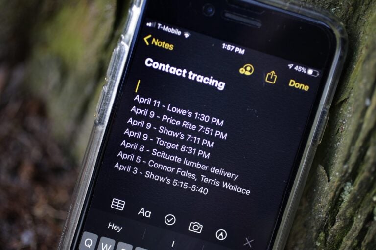 A smartphone belonging to Drew Grande, 40, of Cranston, R.I., shows notes he made for contact tracing Wednesday, April 15, 2020. Grande began keeping a log on his phone at the beginning of April. (Steven Senne / AP Photo)