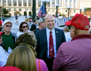 Pennsylvania state Sen. Doug Mastriano, R-Franklin, center, speaks to supporters of President Donald Trump