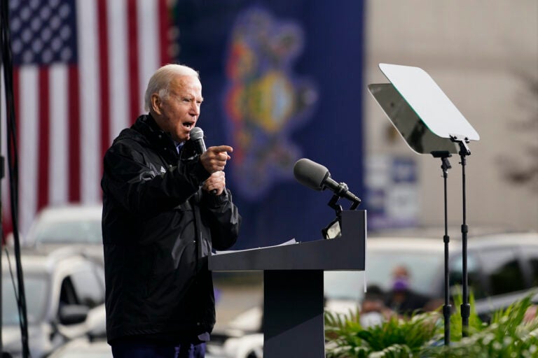 Joe Biden speaks at a “Souls to the Polls” drive-in rally at Sharon Baptist Church